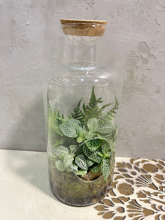 Zelený úkryt v láhvi